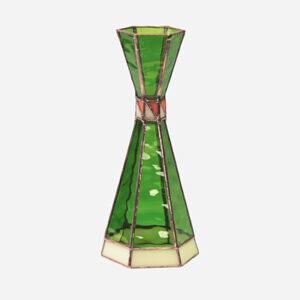 A green and beige decorative hourglass-shaped object.