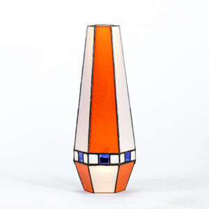 A tall, tapered vase with orange and blue geometric patterns.